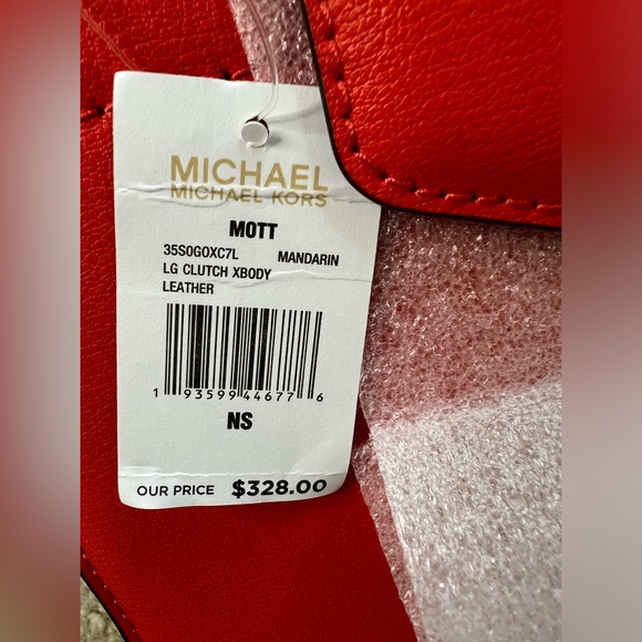 MICHAEL KORS
MOTT
35SOGOXC7L
LG CLUTCH XBODY
LEATHER
MANDARIN - Picture 1 of 11
